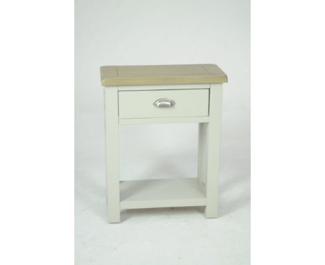 A modern painted and light oak side tableWith a slab top above a single drawer with brush metal cup handle raised on legs of 