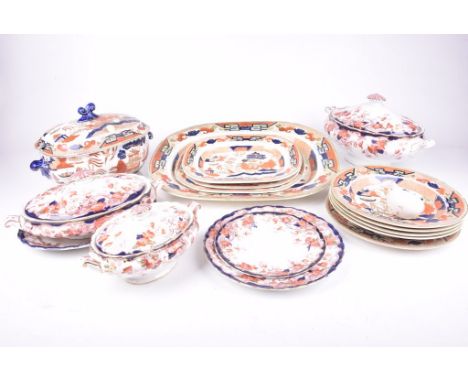 A collection of Victorian Ironstone china dinner waresComprising four graduated platters, four soup plates, soup tureen, dinn