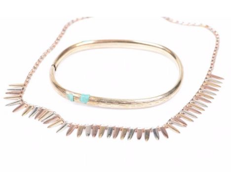 A 9ct tri-coloured gold fringed necklace Together with, a yellow metal bangle, stamped 9K, (a.f.), (2) weight combined 14.5g