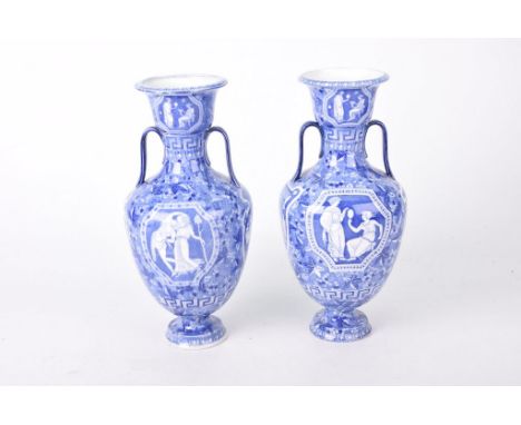 A pair of early 20th Century Copeland Spode transfer printed vasesEach of baluster form rising from a low pedestal and flanke