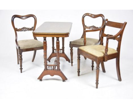 A Victorian mahogany side table, two Victorian rosewood dining chairs and a Regency mahogany elbow chairThe rectangular Victo