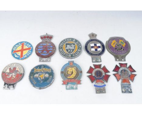 A collection of various car and related enamel badges, mid 20th CenturyTo include Metropolitan Car Club Carmell, Royal Yachti
