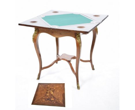 An exceptional Louis XlV style inlaid rosewood envelope games tableThe quarter section folding top concealing a baize lined p