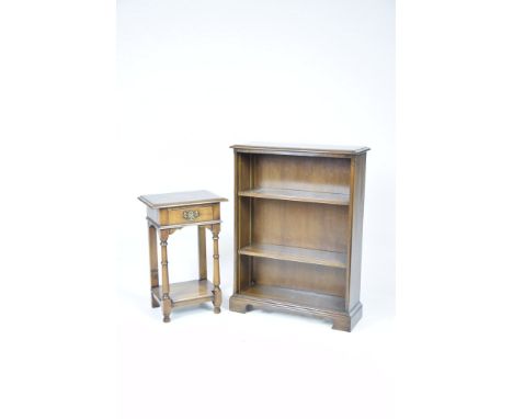 A Simpsons of Norfolk cherry-wood open bookcase and conforming lamp tableThe bookcase with a rectangular moulded top above tw