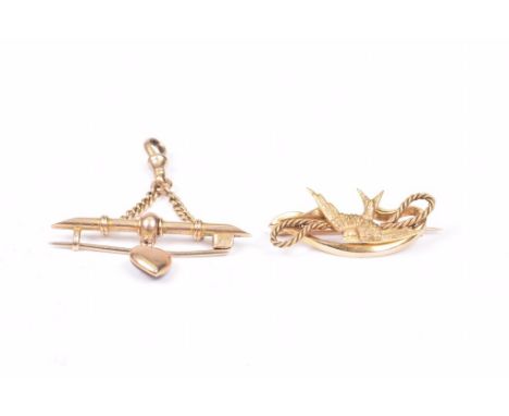 A Victorian 15ct gold broochDepicting a swallow, (a.f.), together with, a 9ct gold T-bar conversion bar brooch, suspending a 