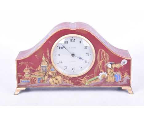 An early to mid 20th Century chinoiserie mantel clockThe red painted 8-day clock with sloped sides, painted to the exterior w