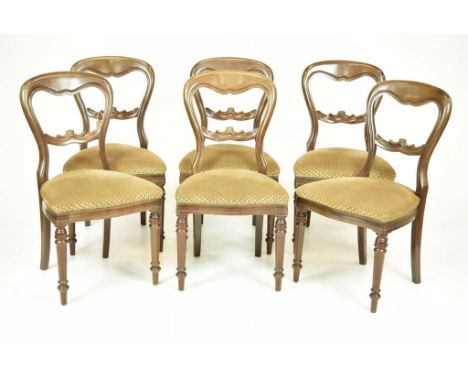 A set of six Victorian style mahogany spoon back dining chairsEach with a scrolling crest rail above a brown velour Serpentin