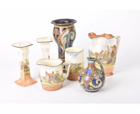 A mixed collection of various ceramicsTo include two 1930's Gouda Art Pottery vases, and a small group of Doulton Series Ware