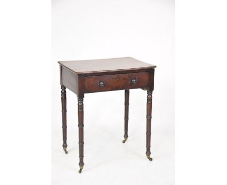 A Georgian mahogany side tableThe rectangular molded top above a single frieze drawer with button handles raised on slender r