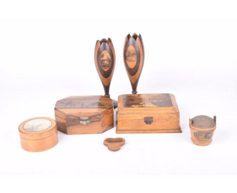 A collection of various treen Mauchline Ware itemsTo include two "Burns Cottage" goblets, 18cm high, a "Burns" churn shaped p