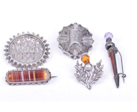 A Scottish silver agate brooch (af)In the form of a dagger, set with amethyst and red agate, together with, a banded agate an