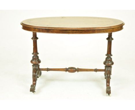 A Victorian burr walnut and inlaid, quarter veneered oval side tableThe oval top inlaid with a hexagonal pendant and link des