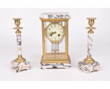 A French late 19th Century 8-day mantel clock garnitureComprising a four-glass and marble clock with gilt metal mounts, the c