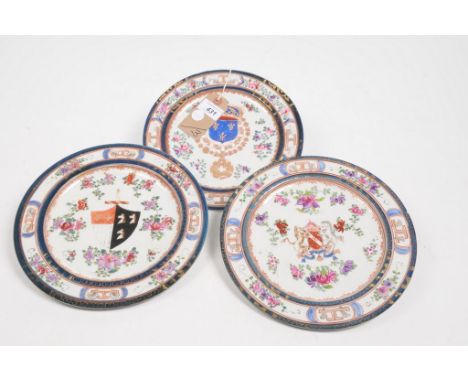 A collection of three early 20th Century Armorial cabinet platesEach of circular form with shallow well painted with a coat o