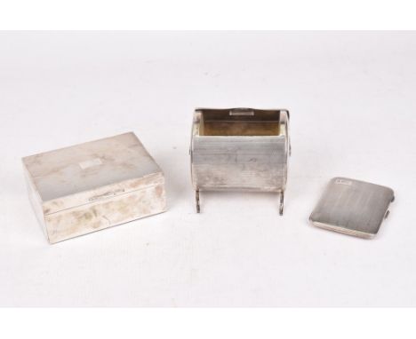 A silver cigarette boxOf rectangular form, with engine turned decoration, vacant cartouche, by J W Lambourn & Son, Birmingham