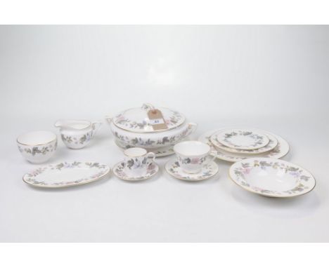 An extensive Royal Worcester 'June Garland' tea and dinner service Comprising tureens, side, dinner plates, cups, saucers, co