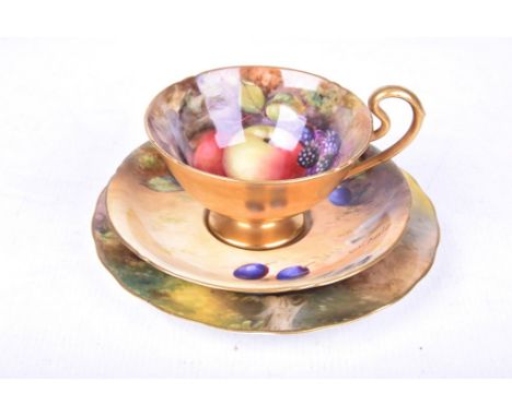 A Royal Worcester fruit painted trioComprising teacup painted with apples and blackberries, painted by H. Everett, a saucer p