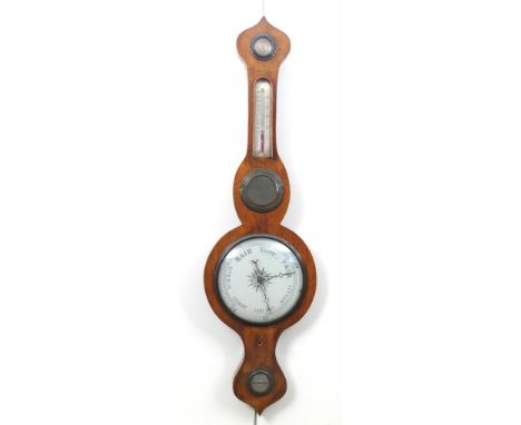 A late 19th Century mahogany banjo aneroid barometerThe teardrop finial and apron, enclosing silvered dial, with glazed therm