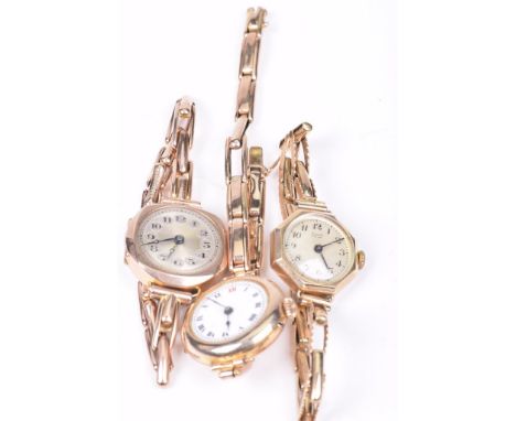 An early 20th century 9ct gold manual wind wristwatchOf circular form, with a white dial and black and red Roman numerals, to