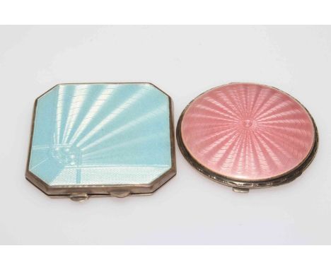 Two silver and enamel compacts, pale blue square form Birmingham 1937, 6.5cm across, and pick circular Birmingham 1935, 6cm d