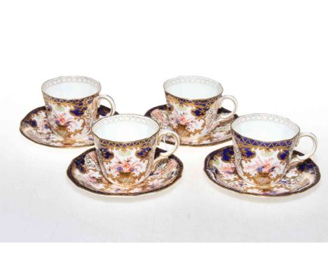 Set of four Royal Crown Derby cups and saucers.