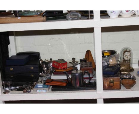 Collection of metalwares including cased goblets and cutlery, teapots, carriage clock, table lamp, metronome, etc.