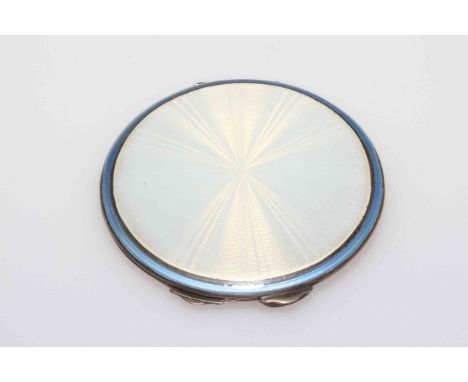 Asprey's silver and white enamel compact, with blue line border, Birmingham 1936, 7cm diameter.