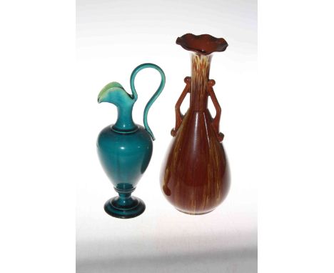 Linthorpe Pottery turquoise glazed ewer, shape no. 1977, together with tall Linthorpe Pottery two handle vase (2).