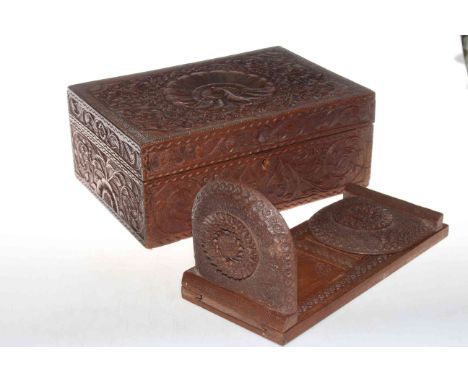 Heavily carved wood box and similar carved wood expanding book trough.