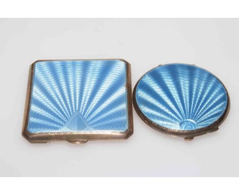 Two silver and blue enamel compacts, square form by Walker and Hall, Chester 1954, 7cm across, circular Birmingham 1937, 6.5c