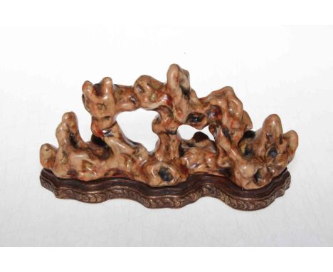 Chinese ceramic coral ornament, with gilt mark to base, 21cm across.