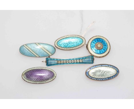 Collection of six silver and enamel brooches, largest 4cm across.