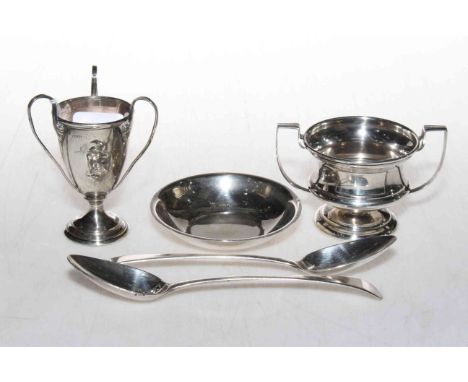 Two small silver trophy cups, small dish, and two Georgian dessert spoons (5).