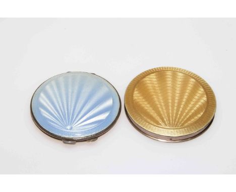 Two silver and enamel compacts, in blue and gold guilloché, Birmingham 1920 and 1941, both approximately 7cm diameter.