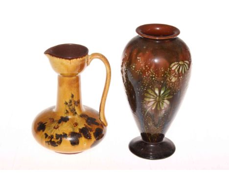 Linthorpe Pottery daisy decorated vase, shape no. 1609 and with artists monogram, 18.5cm, and Linthorpe Pottery ewer, 15cm (2