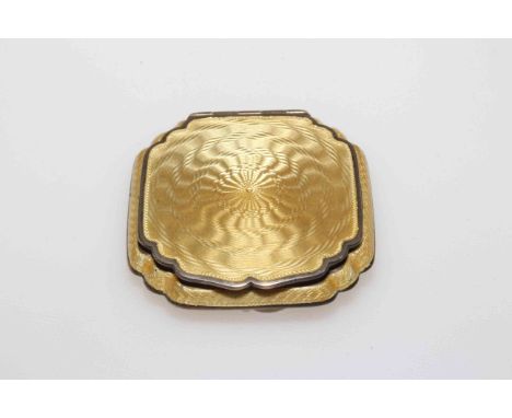 Asprey's silver and gold enamel compact of shaped square form and with swivel grille, Birmingham 1931, 5.5cm.