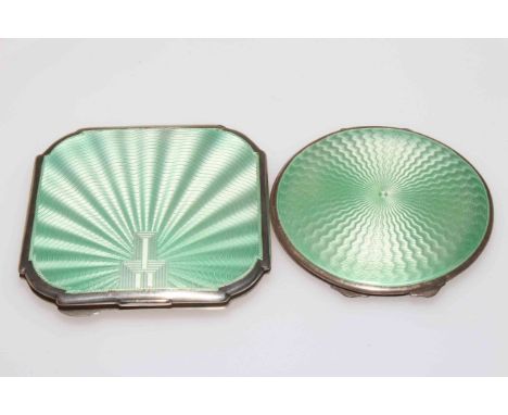 Two silver and pale green enamel compacts, of square form 8.5cm across, Birmingham 1934, and circular 7.5cm diameter, Birming