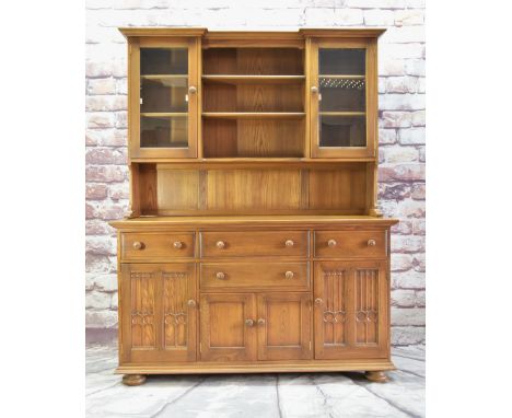 ERCOL ELM INVERTED BREAKFRONT  DRESSER, part glazed and shelved upper section on cupboard base fitted with two drawers, 199h 