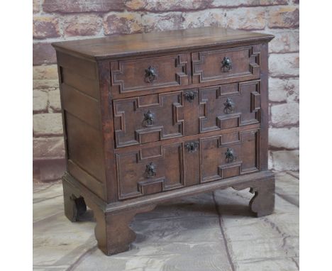 LATE 17TH / EARLY 18TH CENTURY GEOMETRIC JOINED OAK CHEST OF SMALL PROPORTIONS, boarded and moulded top above two short and t