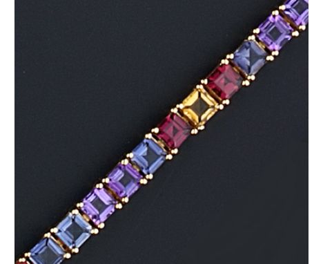 A VARI GEM-SET LINE BRACELET, claw set with a line of vari-coloured square step-cut gemstones in shades of blue, purple, red 