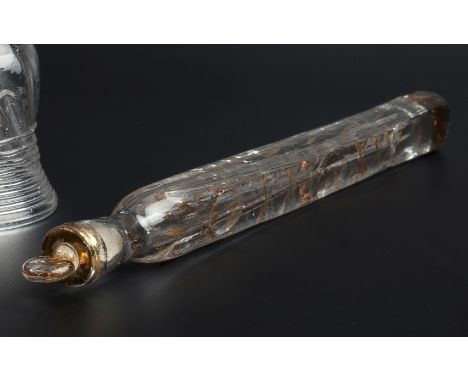 AN ENGLISH GLASS SCENT FLASK AND STOPPER with gilded decoration, 19.7cm long overall