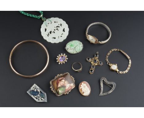 A COLLECTION OF JEWELLERY AND WATCHES, comprising a jade panel brooch, with pierced and carved foliate decoration, (jade unte