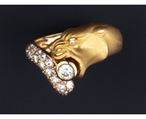 A DIAMOND SET PANTHER RING BY CARRERA Y CARRERA, of crossover design, modelled as a panther's head clutching a brilliant-cut 