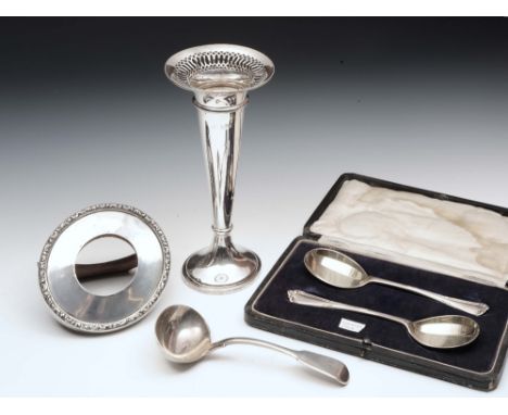 A SILVER SPILL VASE with pierce decorated border, London 1915; a pair of silver serving spoons, London 1923 in fitted case; a