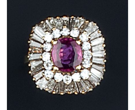 A RUBY AND DIAMOND CLUSTER RING, the oval mixed-cut ruby framed by brilliant-cut diamonds, within an undulating surround of t