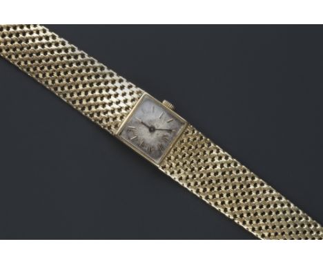 A LADY'S 18CT GOLD WRISTWATCH BY ZENITH, the square signed silvered dial with baton markers, to 18ct gold case numbered 102D9