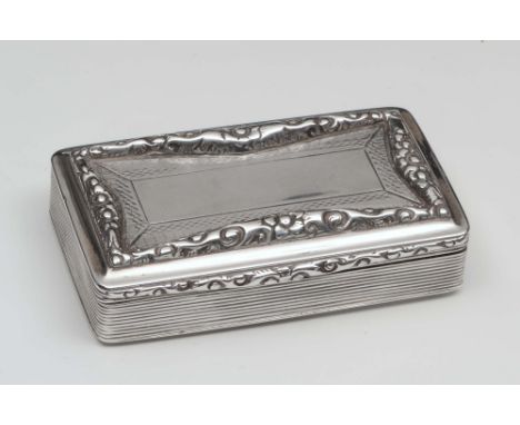 A WILLIAM IV SILVER SNUFF BOX with engine turned and applied foliate decoration, 8cm long, Birmingham 1837 by Francis Clark, 