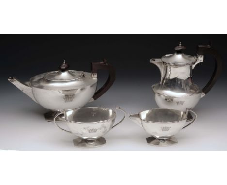 A SILVER FOUR PIECE TEA SERVICE by Israel Sigmund Greenberg, Birmingham 1935 and 1936, of oval form with squared ends compris