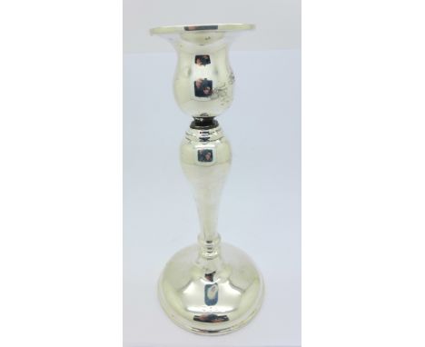 A silver candlestick, 17.5cm, 'neck' repaired