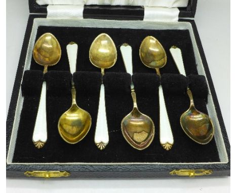 A set of six silver and enamel coffee spoons, Birmingham marks, Adie Brothers, (the enamel on two of the bowls has some damag